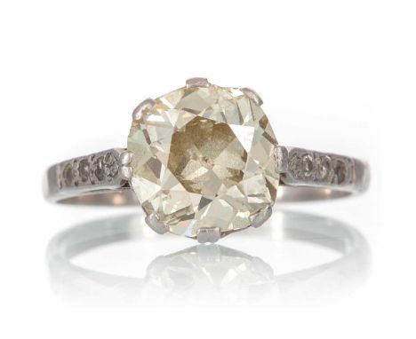 DIAMOND SOLITAIRE RING, set with an Old Mine cut diamond of very approximately 1.70 carats, with diamond chips to the shoulde