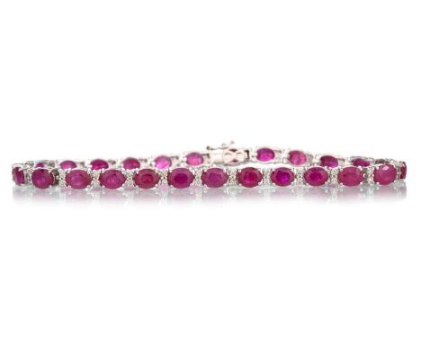 RUBY AND DIAMOND BRACELET, the rubies totalling approximately 10.92 carats, the diamonds totalling approximately 0.46 carats,