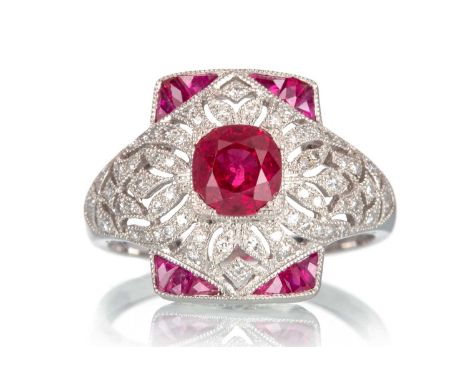 RUBY AND DIAMOND RING, the pierced mount set with rubies totalling approximately 1.00 carat, the diamonds totalling approxima