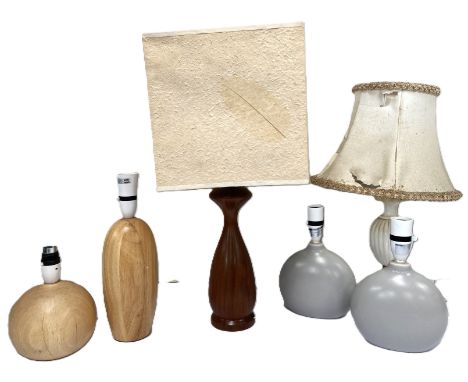 A group of three wood turned table lamps, one with naturalistic shade, 53 cm to top of shade, also two ceramic lamps and one 