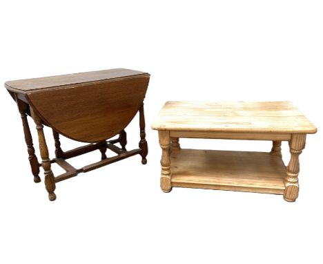 A 1930/40s oak gate leg table (one gate lacking), when closed 72 x 86 x 43cm, and a pine coffee table.&nbsp;