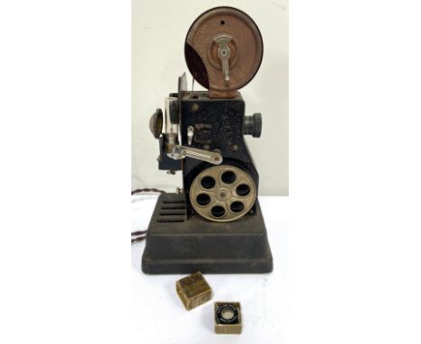 FILM interest, a group of projectors to include: Dekko, Kodak, Belle &amp; Howell, Eumig and a Leitz slide projector, (5).&nb