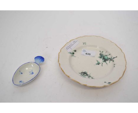 An 18th century Derby caddy spoon of egg shape with shell moulded handle decorated with floral sprigs in dry blue together wi