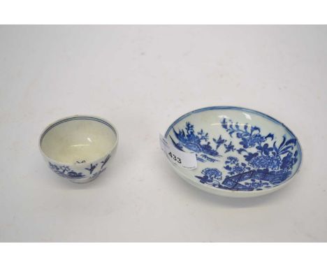 A Lowestoft teabowl and saucer c.1775 of small size decorated with a version of the fence pattern pseudo Worcester crescent m