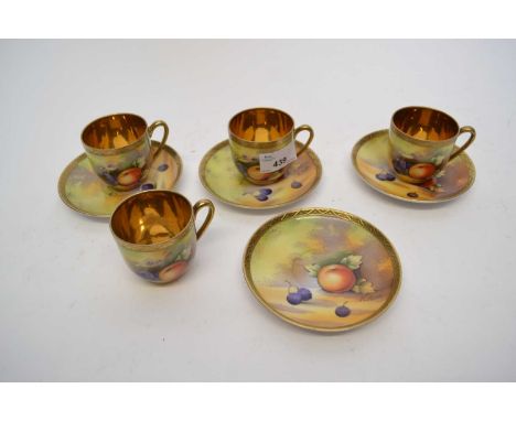 Group of four Japanese porcelain fruit painted cups and saucers, some signed by K Asai