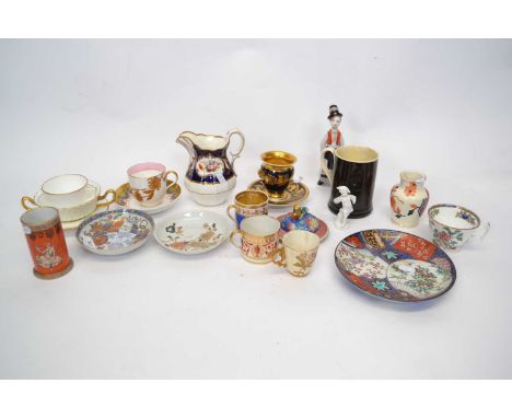 Group of porcelain wares including a Paris porcelain botanical cup and saucer, small Berlin figure, Chinese porcelain saucers