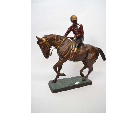 Large Spelter model of a racehorse with jockey up on rectangular base, 50cm long