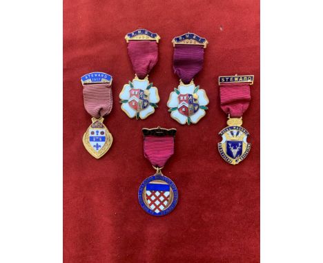 Royal Masonic Benevolent Institution Silver Jewels (5) including dates 1951, two 1952, 1957 and 1959. Silver gilt and enamel.