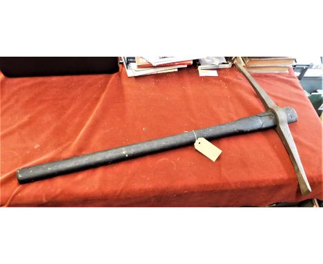 British WWII Military Pick Axe, dated 1942 and made in Sheffield. It is in good condition with some wear, retaining almost al