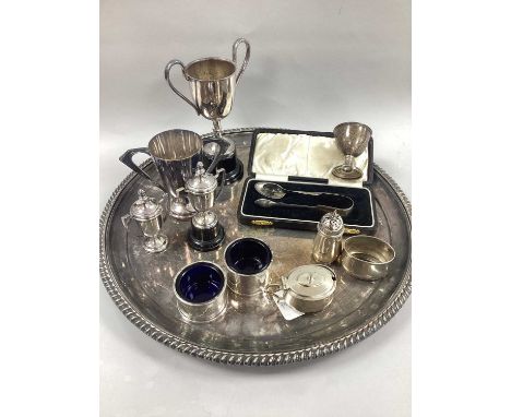 A Pair of Hallmarked Silver Salts, with reeded detail and blue glass liners; A Hallmarked Silver Three Piece Cruet Set, (dama
