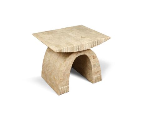 A 20th century fossil clad coffee table, to a fibreglass shell, the rectangular top raised on an arched base 51 x 61 x 51cm (