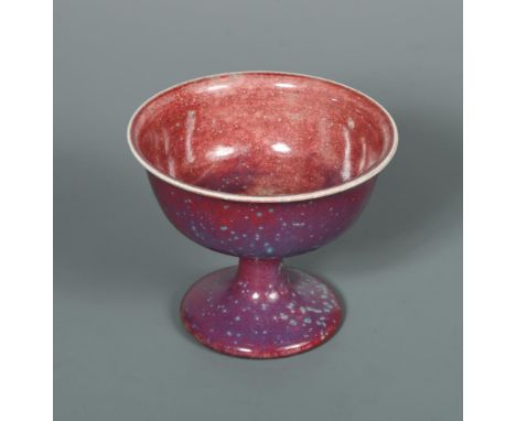 A Ruskin high-fired flambé stem cup, the circular bowl with slightly flared rim raised on a spreading foot, all over purple-g