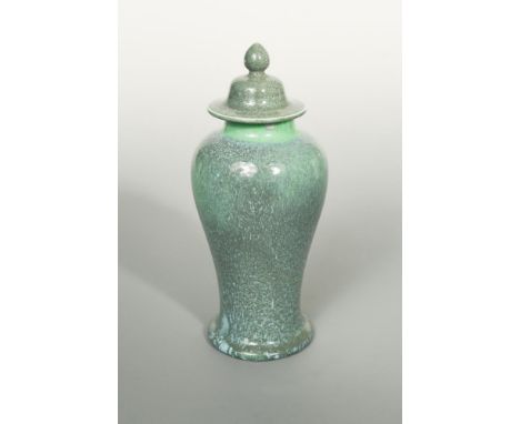 A Ruskin high-fired soufflé glaze jar and cover, 1908, the ovoid body with mottled green soufflé glaze, shape 227, impressed 