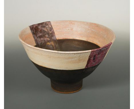 § Robin Welch, (British, born 1936), a large stoneware footed bowl, white and brown gaze with puce decoration and copper lust