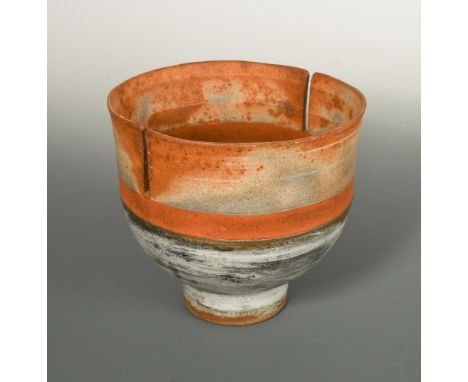 § Robin Welch, (British, born 1936), a stoneware footed bowl, the rim with opposing incisions, glazed with an orange band, bu