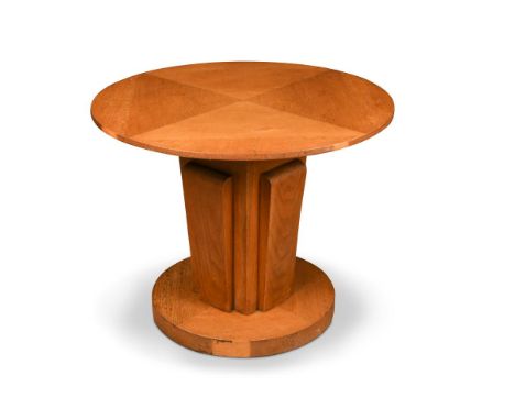 An Art Deco oak centre table, the circular top on tapering pedestal support with applied step design to a circular foot 81 x 
