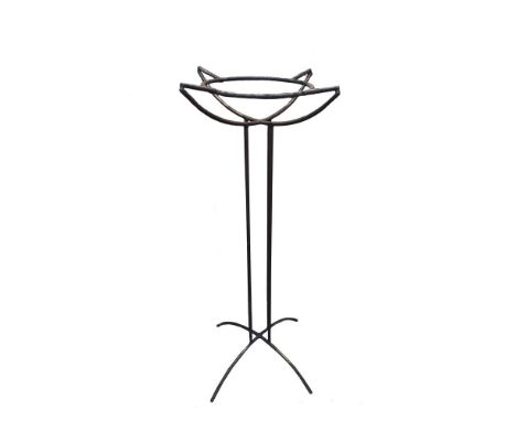 A brass jardiniere stand, formed as a ring on angled quad supports raised on four rod supports and spreading legs 100cm (39in