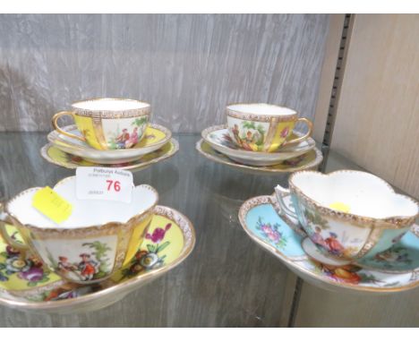 TWO CONTINENTAL PORCELAIN COFFEE CUPS AND SAUCERS, AND TWO TEA CUPS, SAUCERS AND SIDE PLATES, DECORATED WITH COUPLES IN GARDE