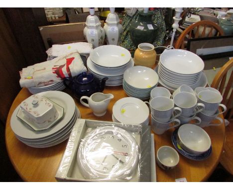MIXED HOME WARE INCLUDING WHITE DINING CHINA , FOUR TABLE LAMPS , WALL CLOCK AND OTHER ITEMS.