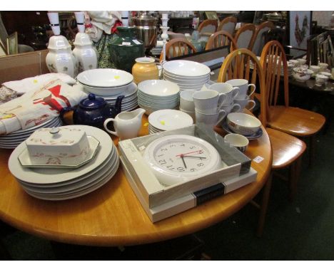 COMPOSITE LIGHT WOOD CIRCULAR KITCHEN TABLE, WITH A SET OF FOUR STICK BACK CHAIRS.