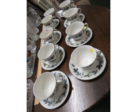 EIGHT ROYAL DOULTON BURGUNDY PATTERN TEA CUPS AND SAUCERS WITH SUGAR BOWL.