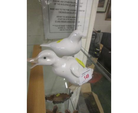 NAO PORCELAIN FIGURE OF A DUCKLING TOGETHER WITH ONE OTHER WHITE PORCELAIN BIRD.