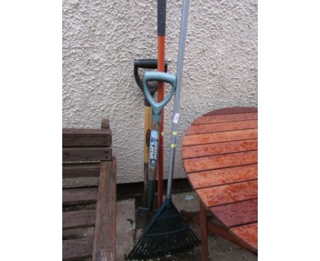 FOUR LONG HANDLED GARDEN TOOLS