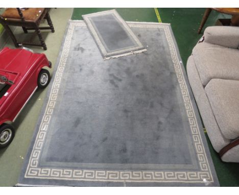 LARGE PALE BLUE GROUND FLOOR RUG WITH GEOMETRIC BOARDER AND TASSEL ENDS TOGETHER WITH A MATCHING RUNNER.