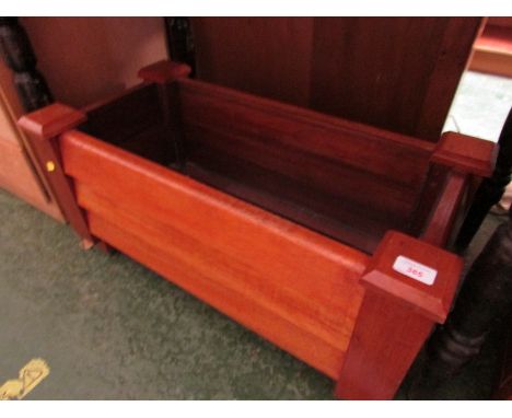 HARDWOOD INTERIOR PLANTER TROUGH WITH A PERPLEX LINING.