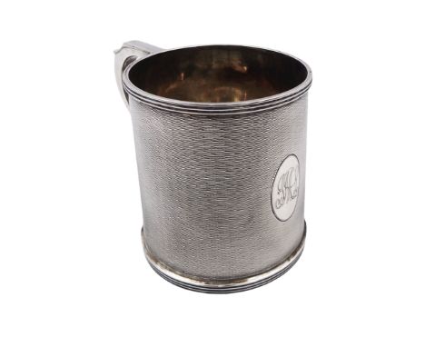 1920s silver christening mug, of slightly tapering cylindrical form, with engine turned decoration and engraved oval cartouch