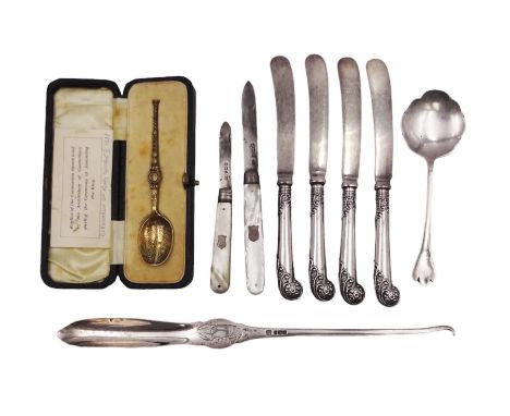 Group of silver, comprising piston grip handled butter knives, 1920s lobster pick, two mother of pearl handled fruit knives, 