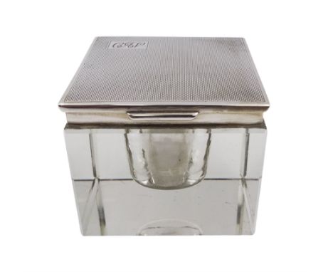 1930s silver mounted glass inkwell, of square form, the silver lid with engine turned decoration and engraved initials, hallm