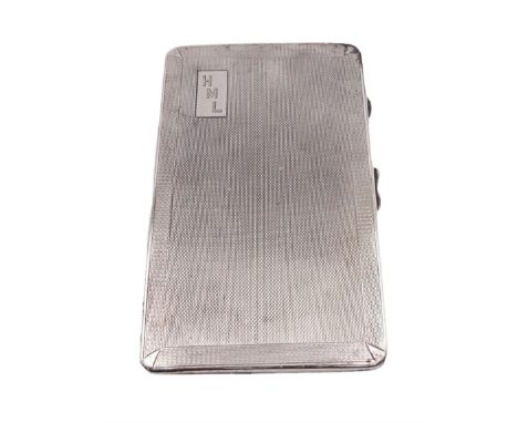 1930s silver cigarette case, of rectangular form, with engine turned decoration throughout and engraved cartouche to front co