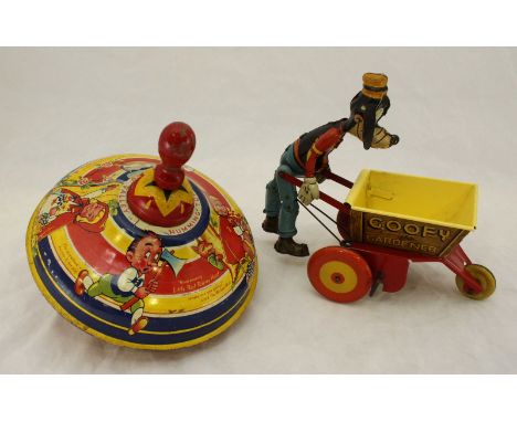 A C.1950's Marx Toys clockwork lithographed tin plate "Goofy the Walking Gardener" toy, together with a tin plate Chad Valley