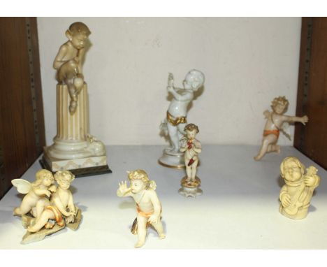 SECTION 21. A small collection of ceramic figures modelled as cherubs etc and two other figures