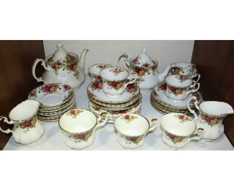 SECTION 6. A 36 piece Royal Albert 'Old Country Roses' pattern tea set, comprising of teapots, cups and saucers etc.