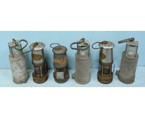 Six 'Tilley' lamps including three by McGeoch, a pair by E. Thomas & Williams and a Maurice Ltd 'The Wolf Safety Lamp Co (6)