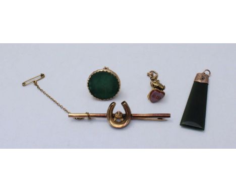 A cased 9ct gold bar brooch, set with a foxes head, together with an Intaglio seal (tests as 9ct gold) another seal and a jad
