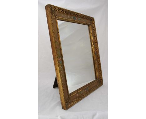 A gilt framed easel mirror of rectangular form, with hand-painted floral decoration. 56 x 46cm.