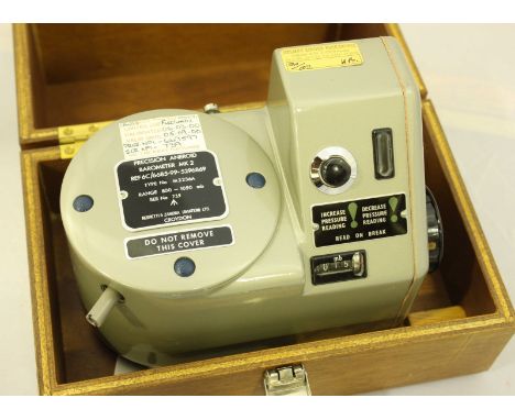 A scarce Admiralty pattern Negretti & Zambra Precision Aneroid Barometer Mk2 M2236A, with odometer type digital display, with
