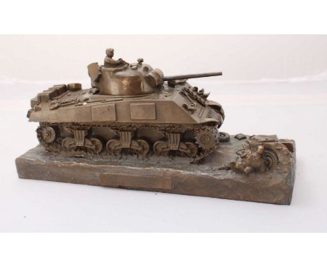 A bronze-patinated resin desk model of a Sherman M4A3 Tank, 24cm long