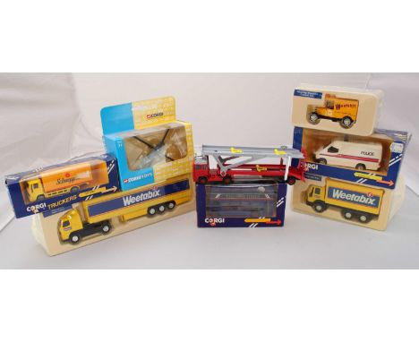 A small collection of boxed Corgi and other toy cars and lorries etc.
