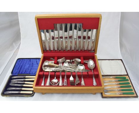 A canteen of silver plated flatware, together with two cased sets of six silver plated knives etc.