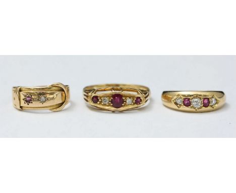 An 18ct gold, ruby and diamond ring, 2.64g, together with two further gold, ruby and diamond rings, 5.11g, (later two rings w