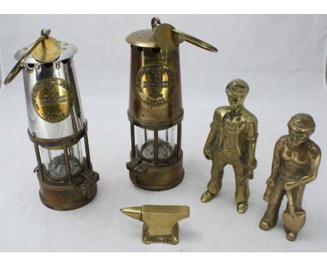 Two 'Eccles,' 'The Protector Lamp & Lighting co.' brass mining lamps with miners 'tally' tickets, together with two brass fig