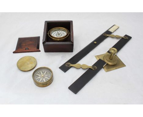 A Norie & Wilson ebonised wooden parallel rule with ivory panel and integral brass compass, together with a brass pocket comp