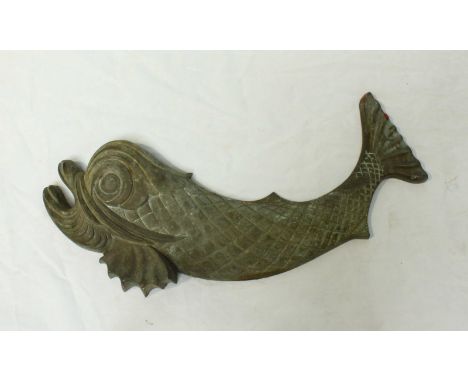 A large cast bronze or brass fish, as used on various Royal Navy insignia, reputably taken from one of the Royal Yacht tender