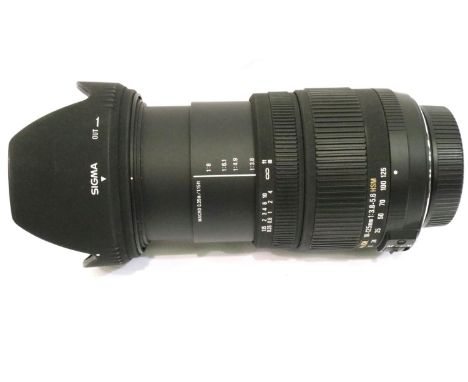 Sigma DC 18-125mm 3.8-5.6 HSM lens with optical stabilizer, Polaroid UV filter, hood and end cap, Nikon fit. Good condition, 
