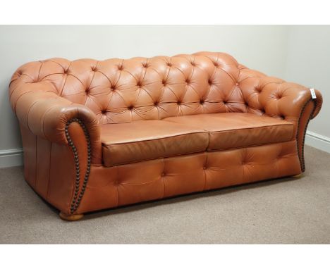 Three seat Chesterfield sofa upholstered in buttoned tan leather, W205cm   Condition Report   Click here for further images, 