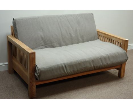 Futon Company 'Oke' two seat oak framed sofa bed with upholstered loose cushion, W153cm   Condition Report   Click here for f